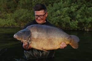 An Image of Danny Fairbrass holding a mainline Bait