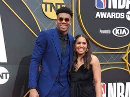 AN Image of Mariah Riddlesprigger and Giannis Antetokounmpo