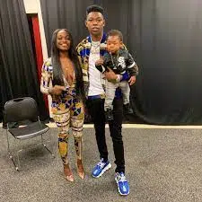 Image of Yung Bleu and her girlfriend and child