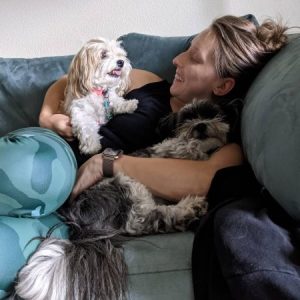 Chelsea Andrews with her puppies