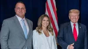 Trashelle Odom with her husband and Donald Trump