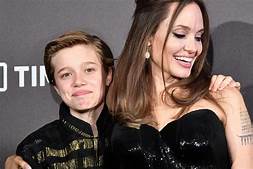Shiloh Jolie Pitt with her mother
