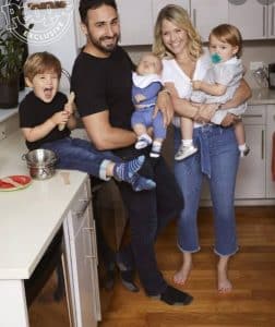 With her husband and children 