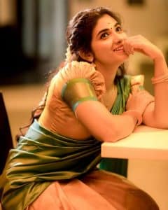 Wearing Saree