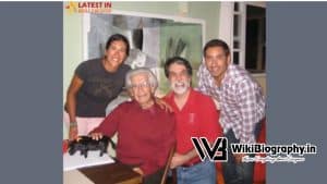 Chris Ledesma with his father and siblings