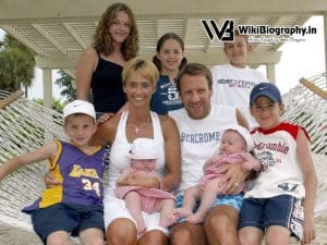 Paul Merson with family