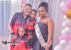 DJ Brownskin with his wife and children