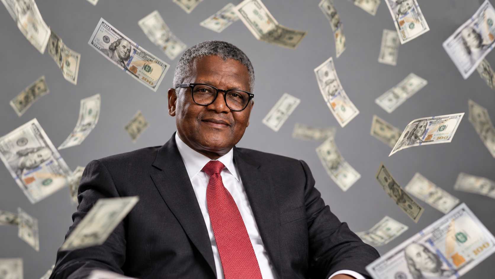 Aliko Dangote in a dark suit against a gray background with falling US dollar bills.