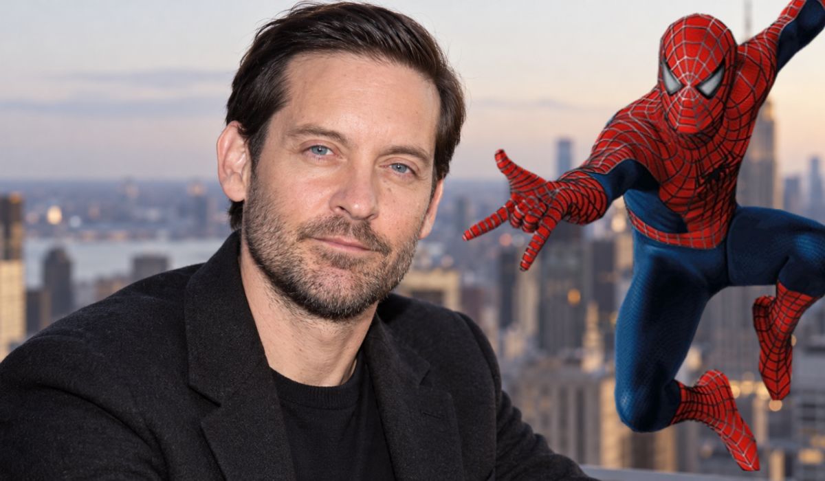 Tobey Maguire alongside Spider-Man with the New York City skyline in the background.Caption: Tobey Maguire reportedly wore between 100 and 200 different Spider-Man suits during the
